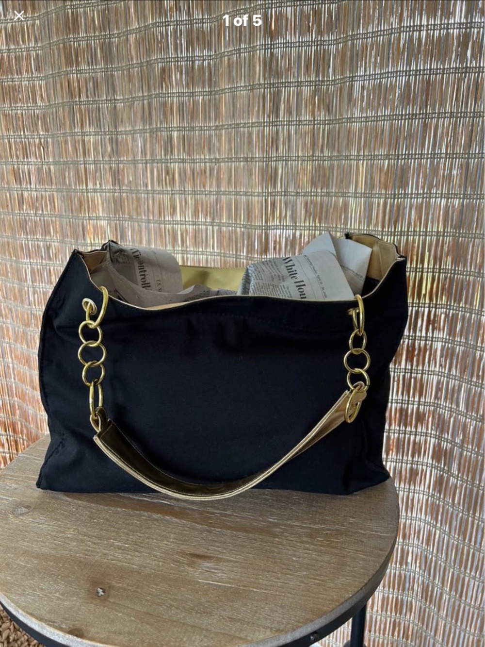 Handbag or beach bag. Black with gold accents
